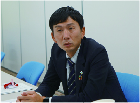 新谷 健悟氏